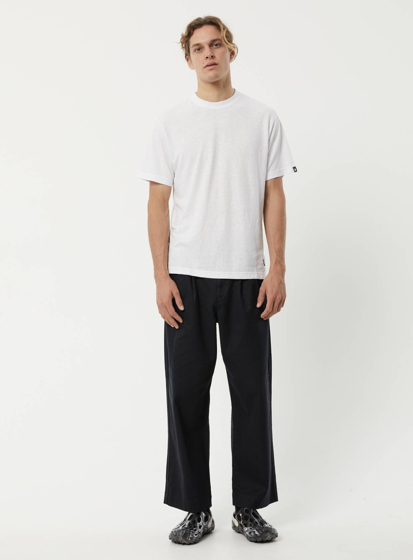 Men's Tan Suit, Black Crew-neck T-shirt, Black Velvet Loafers | Lookastic
